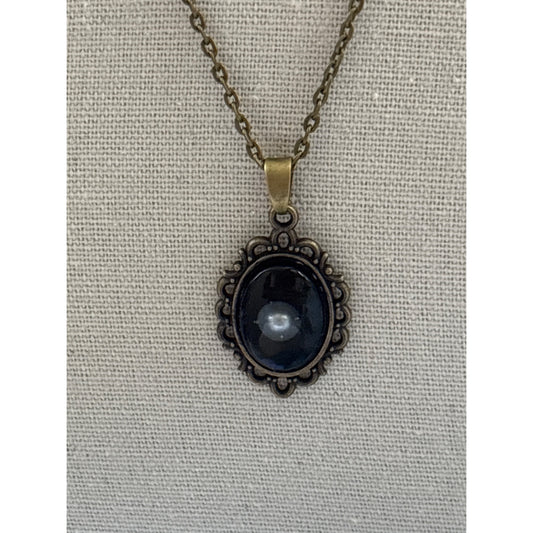 Floating Pearl Pendant Oval Black Background: Handmade in San Diego