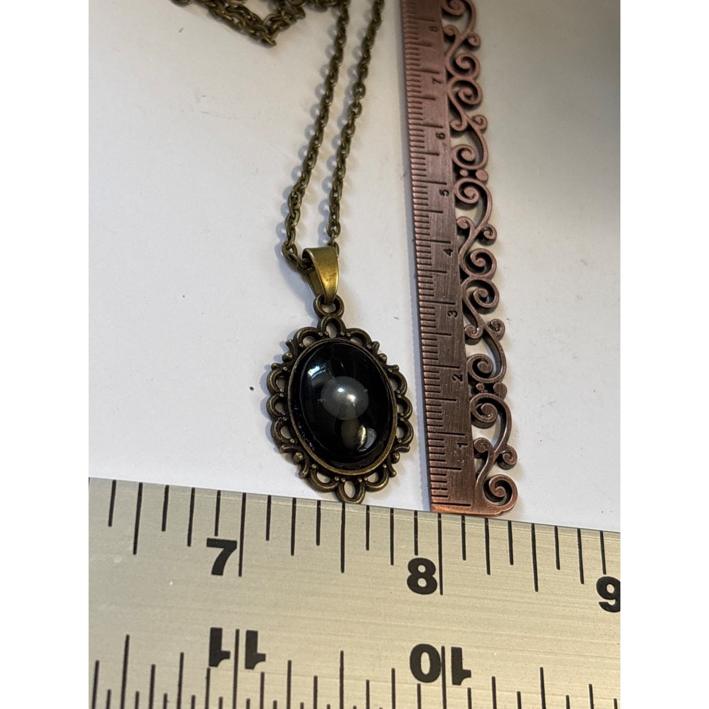 Floating Pearl Pendant Oval Black Background: Handmade in San Diego