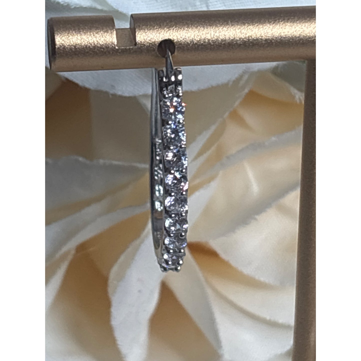 Sterling Silver Hoop Earrings With Sparkling Stones In Elegant Design