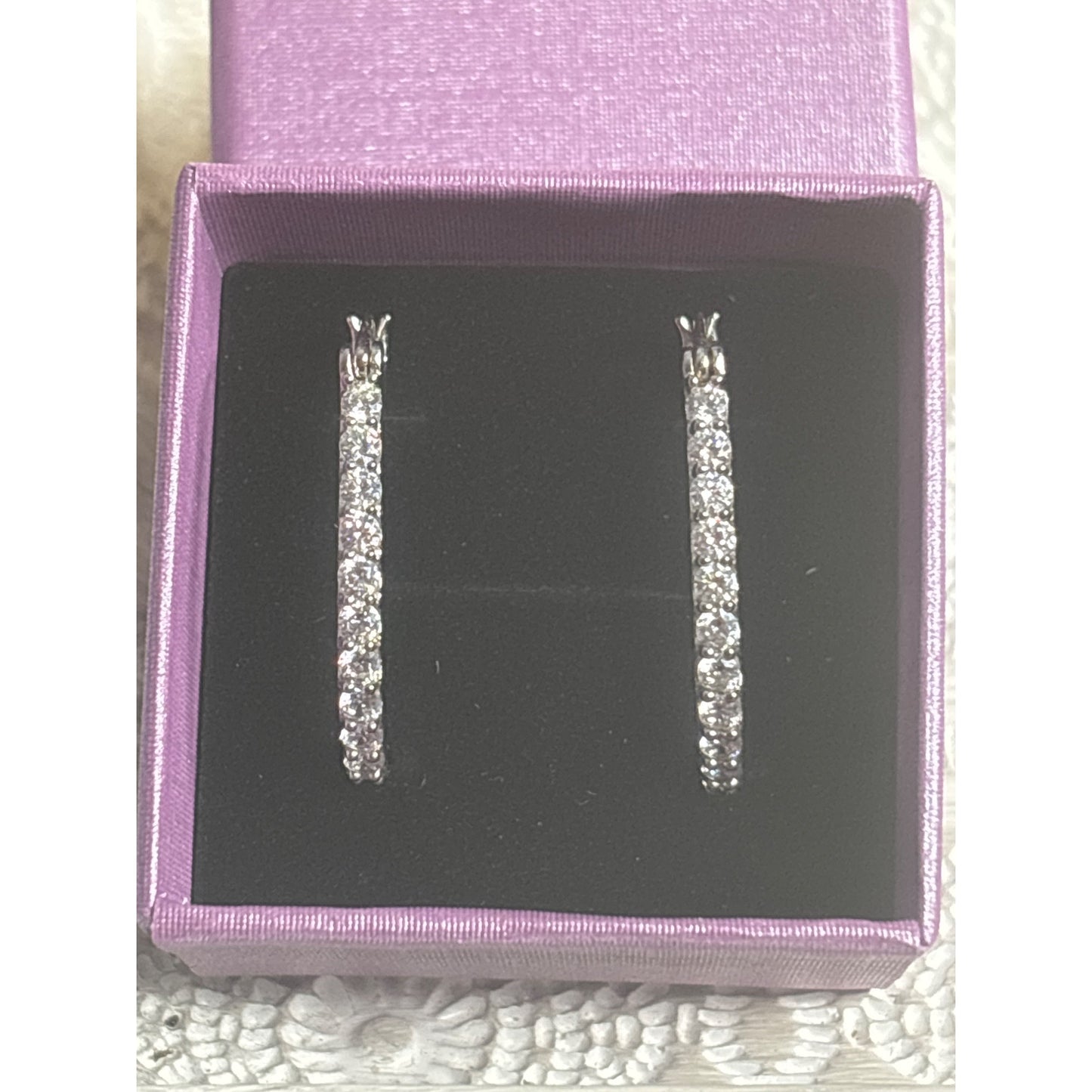 Sterling Silver Hoop Earrings With Sparkling Stones In Elegant Design