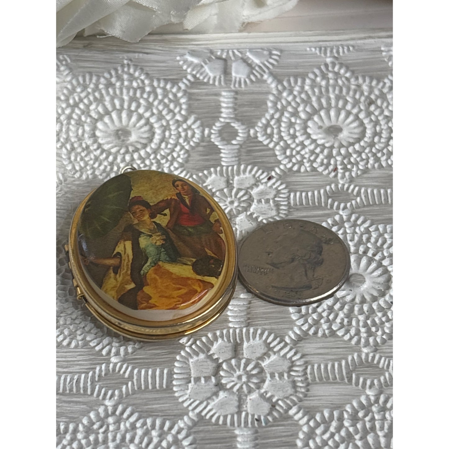 Vintage Gold Tone Oval Locket With Painted Scene Of Couple & Umbrella Hinged Design Holds Two Photos